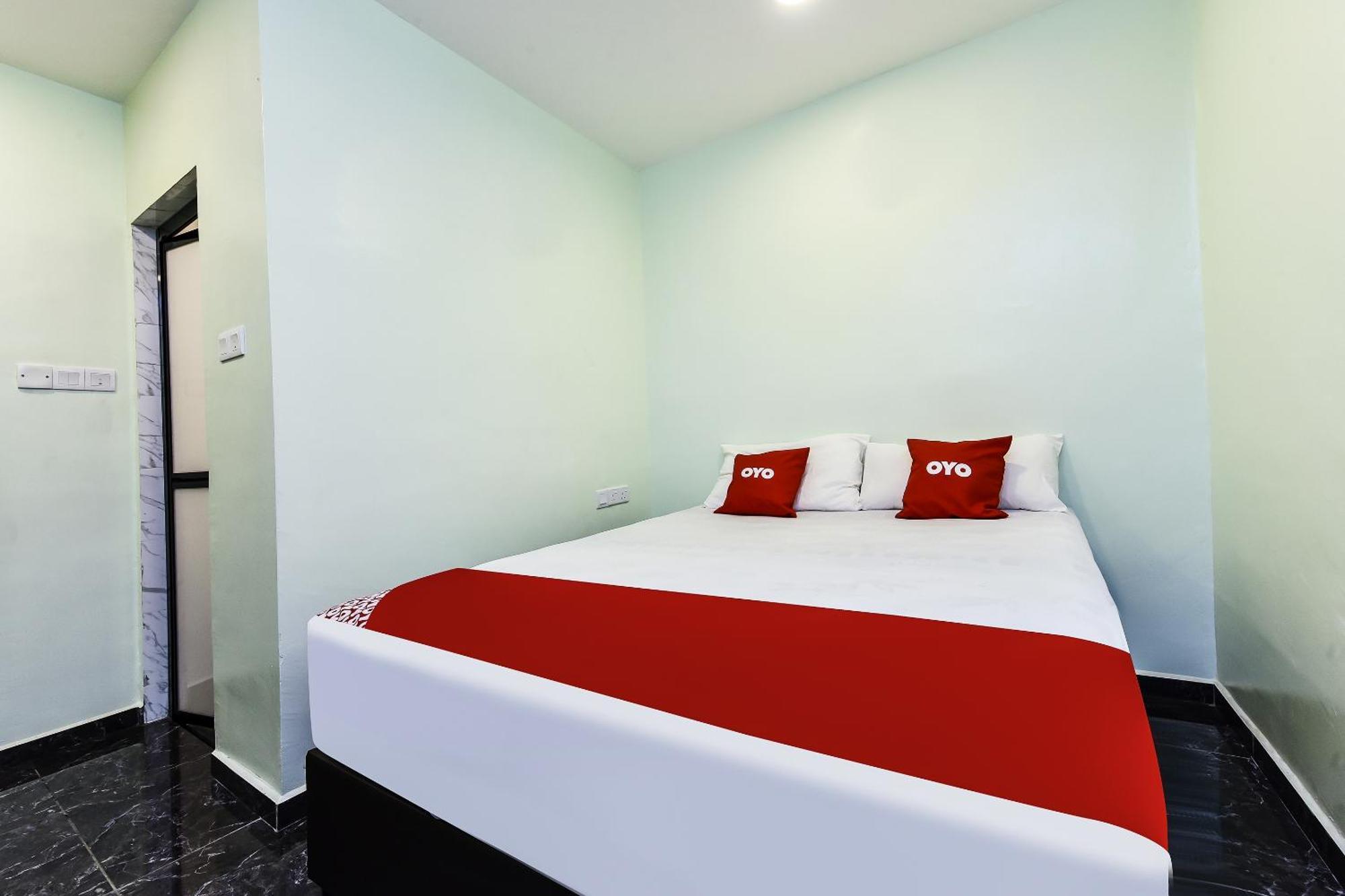 Oyo 90445 Th Hotel Bahau Eksteriør bilde