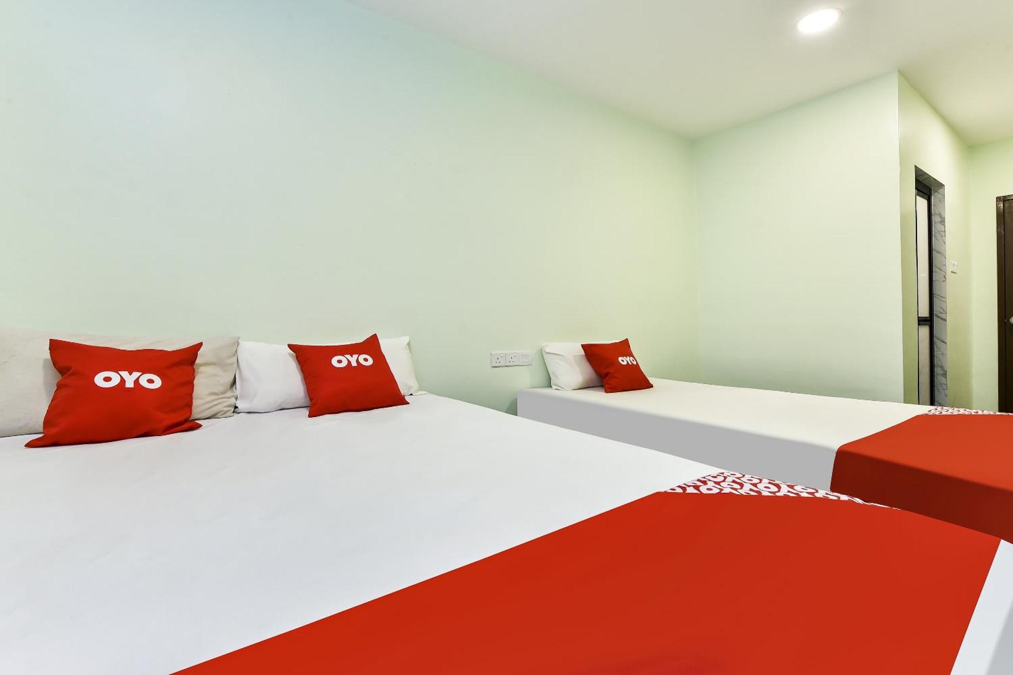 Oyo 90445 Th Hotel Bahau Eksteriør bilde
